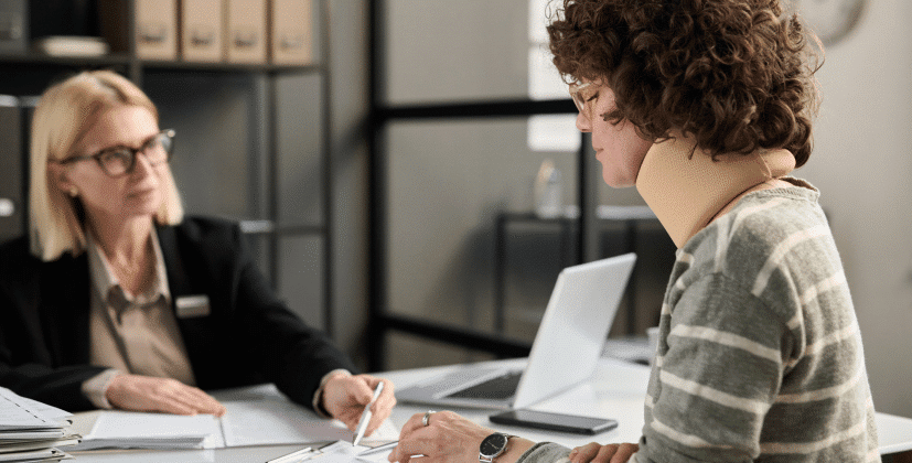 An injured client talking to a lawyer