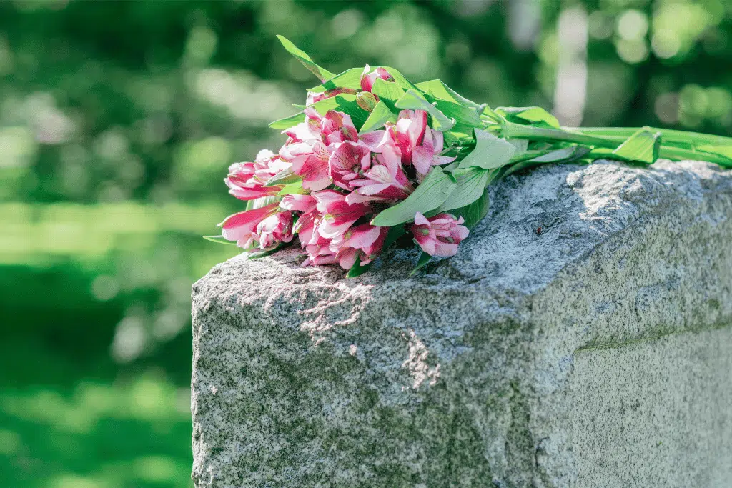 flowers on a headstone