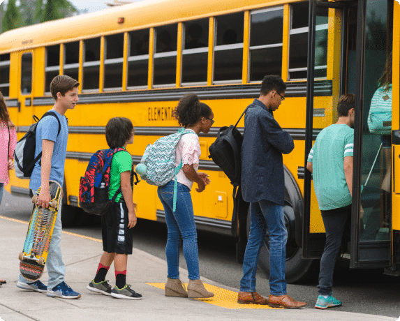 Kids entering a school bus