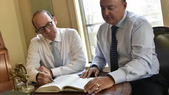 The NST Lawyers looking over a document