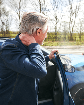 A man with head pain after a car accident