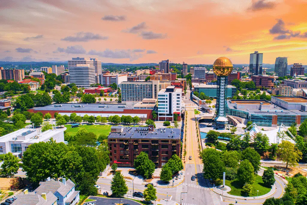 Aerial view of Knoxville, Tennessee, showcasing the city skyline at sunset.